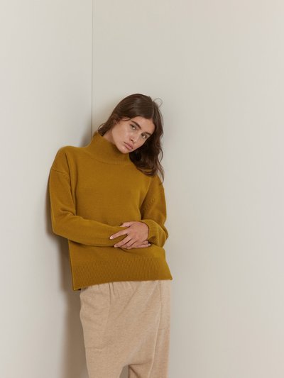 A Mente Wool Turtleneck Long Sleeve Sweater product