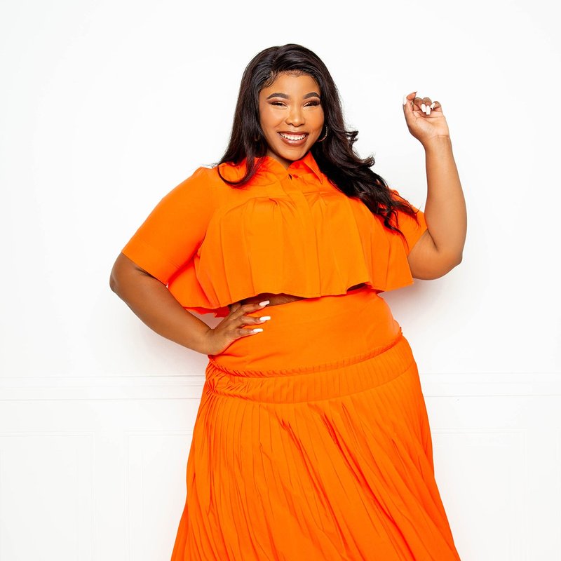 Buxom Couture Pleated Cropped Top And Skirt Set In Orange