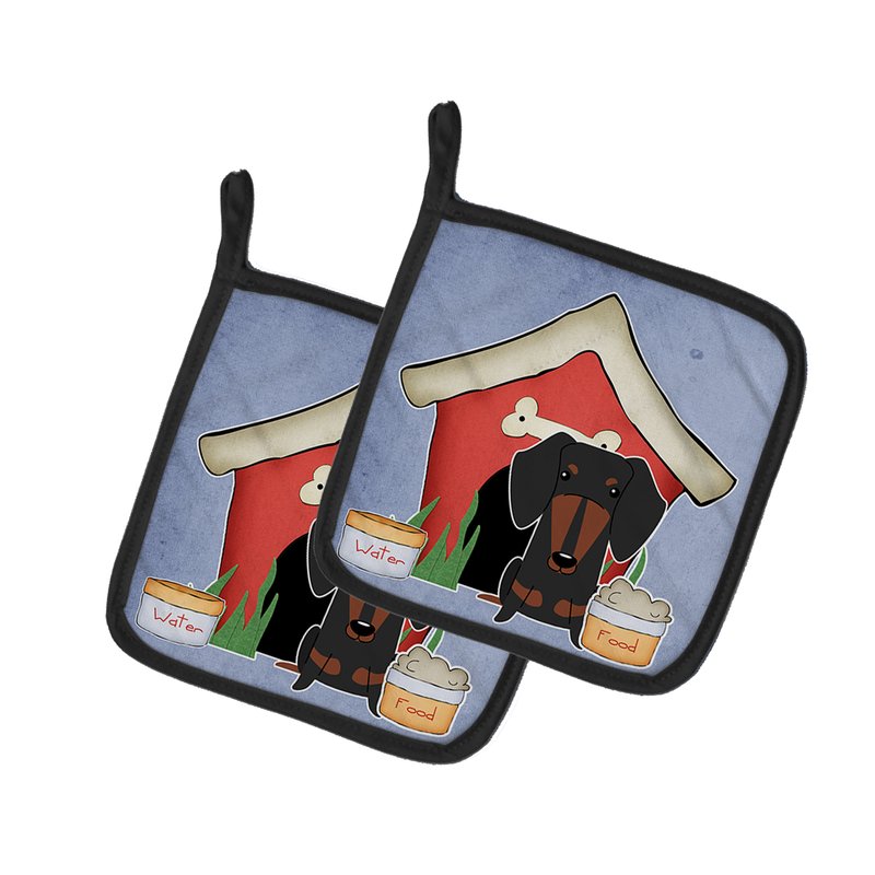 Caroline's Treasures Dog House Collection Dachshund Black Tan Pair Of Pot Holders In Pink