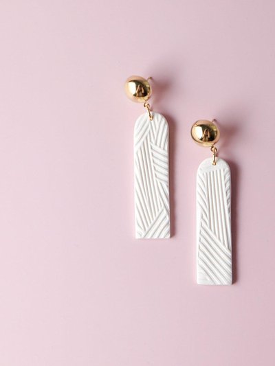 By Chavelli Textured white and gold dangly earrings product