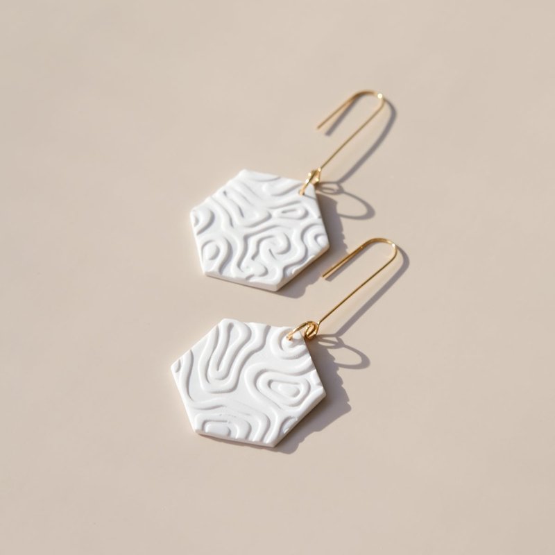 By Chavelli White Swinging Hex Earrings