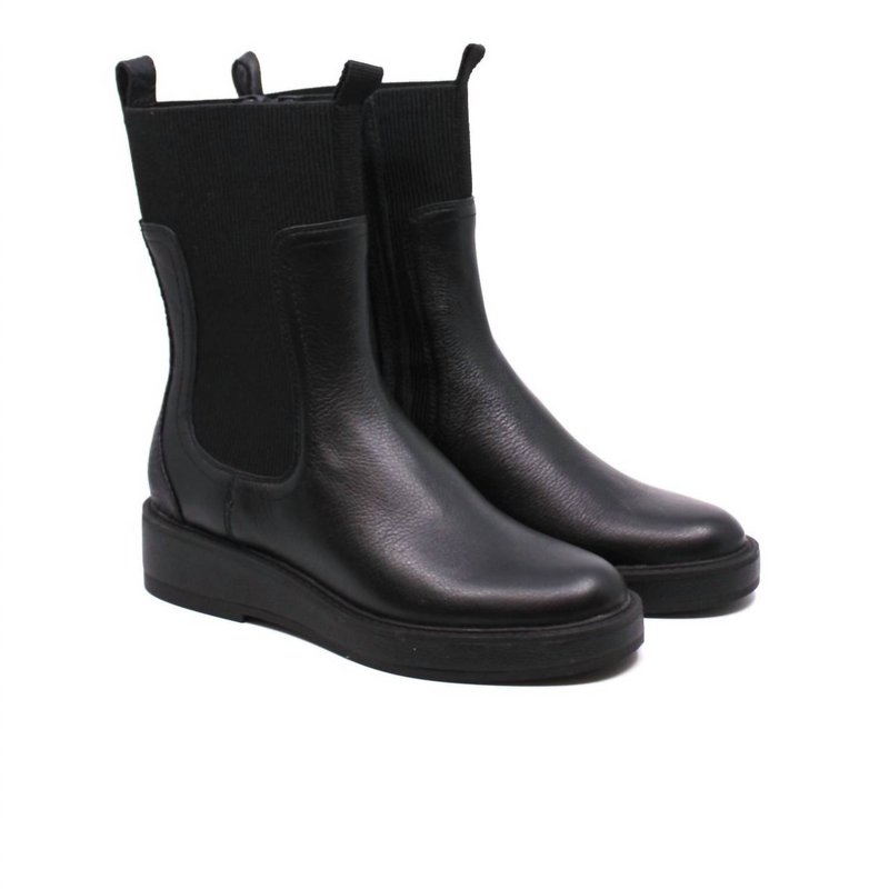 Shop Dolce Vita Elyse H2o Boots In Black