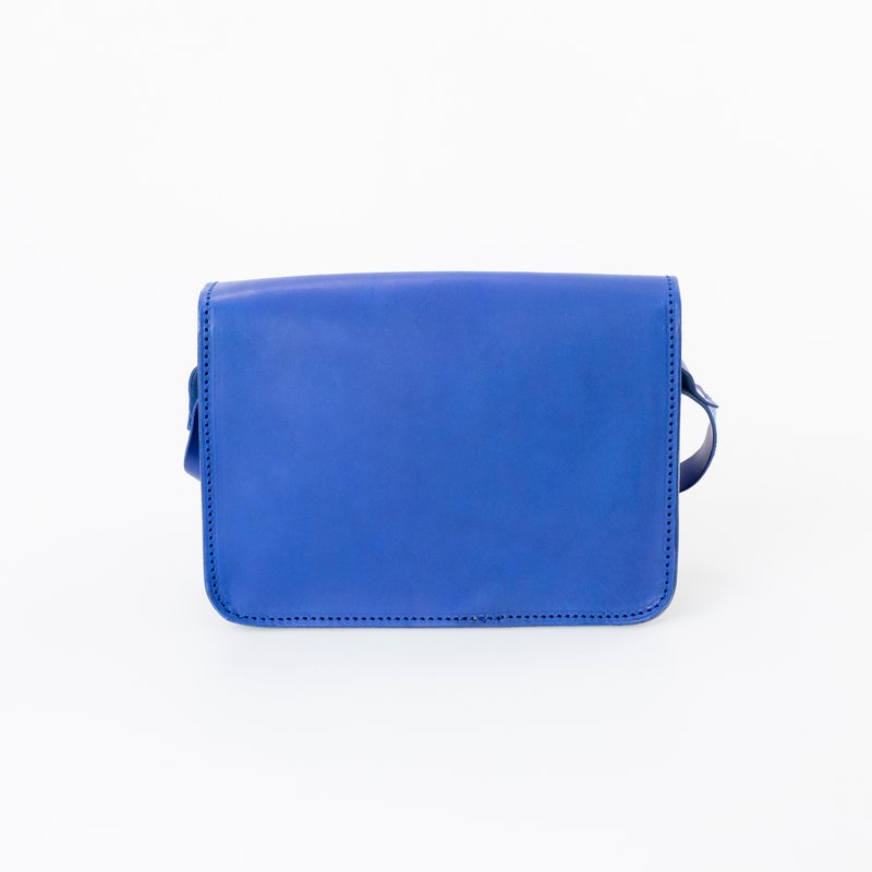 Shop The Dust Company Mod 163 Clutch In Cuoio Blue