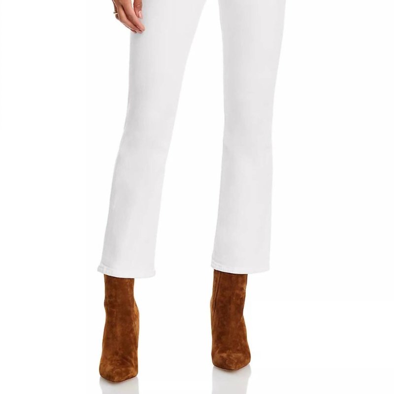 Shop Frame Le Crop Mini Boot Jeans In Blanc In Black
