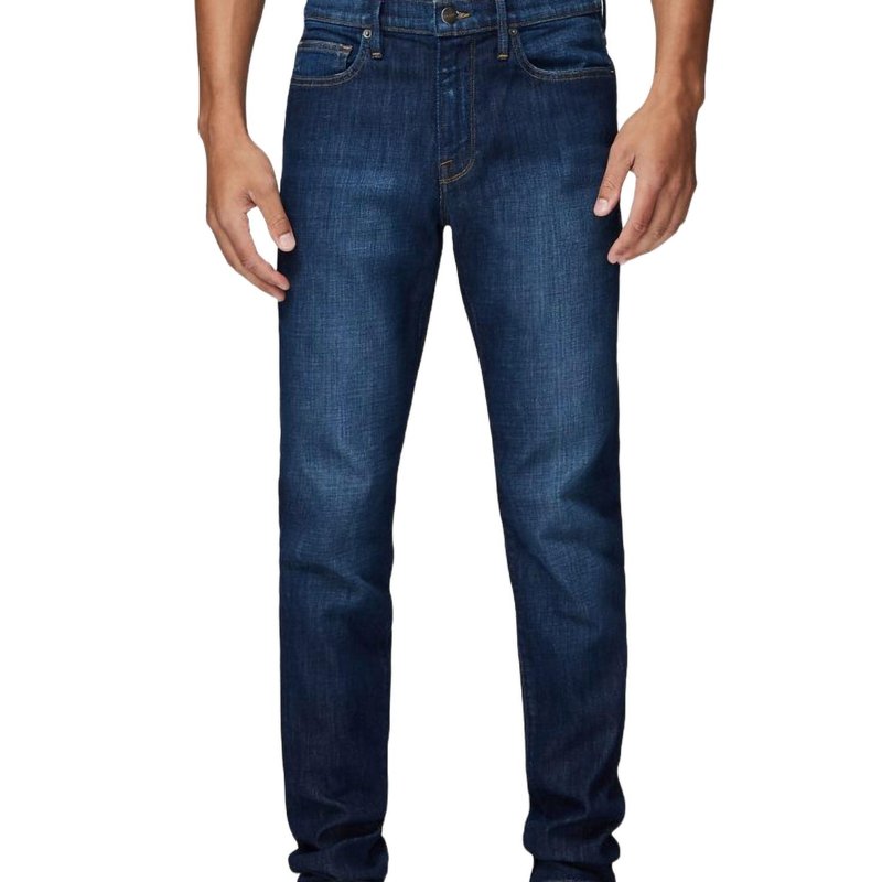 Shop Frame L'homme Athletic Mid Rise Slim Jeans In Watertown In Blue