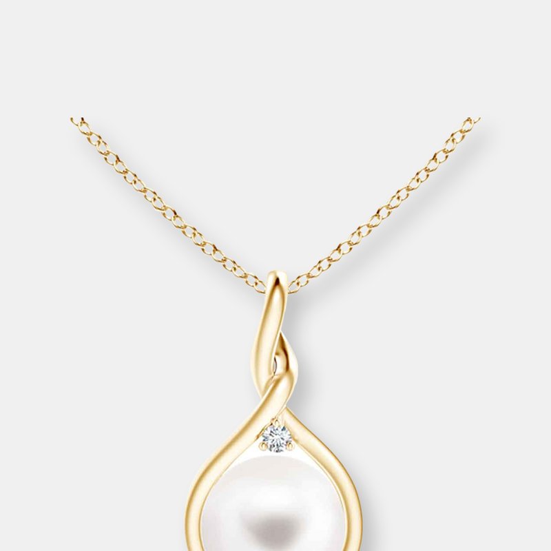 Genevive Sterling Silver With Gold Plated White Round Shell Pearl With Clear Cubic Zirconia Pendant