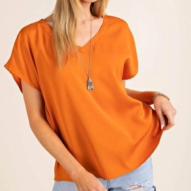 Shop Kori Dolman Sleeve V Neck Top In Rust In Orange