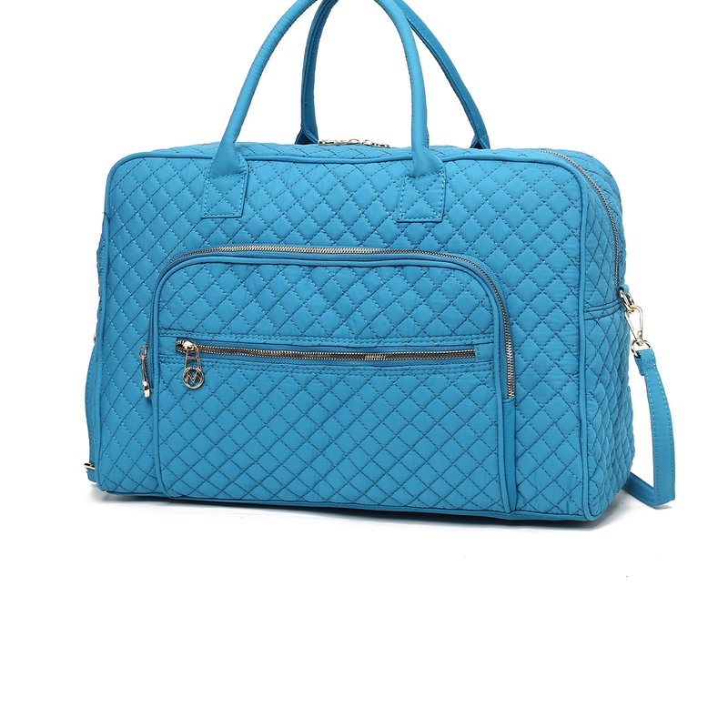 Shop Mkf Collection By Mia K Jayla Solid Quilted Cotton Women's Duffle Bag By Mia K In Blue