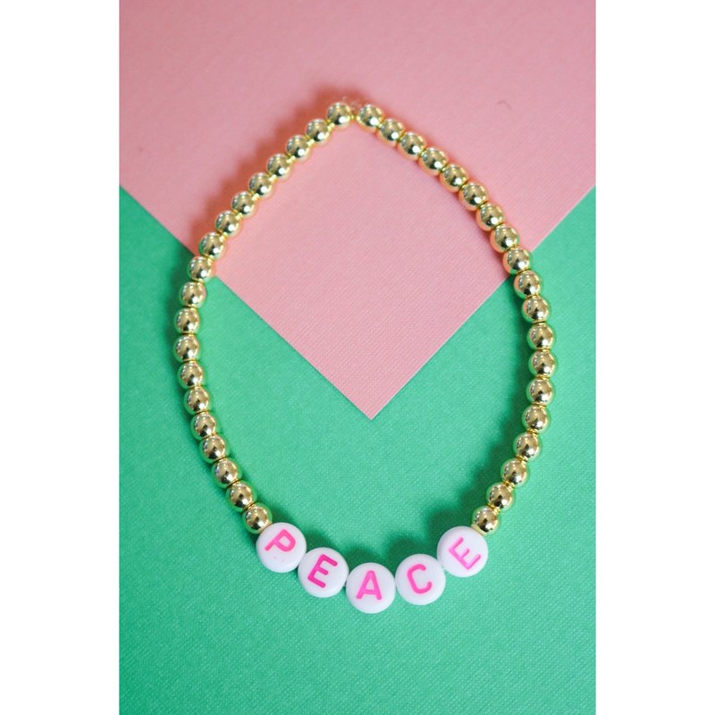 Taylor Reese Pink "peace" Little Holiday Bracelet In Gold