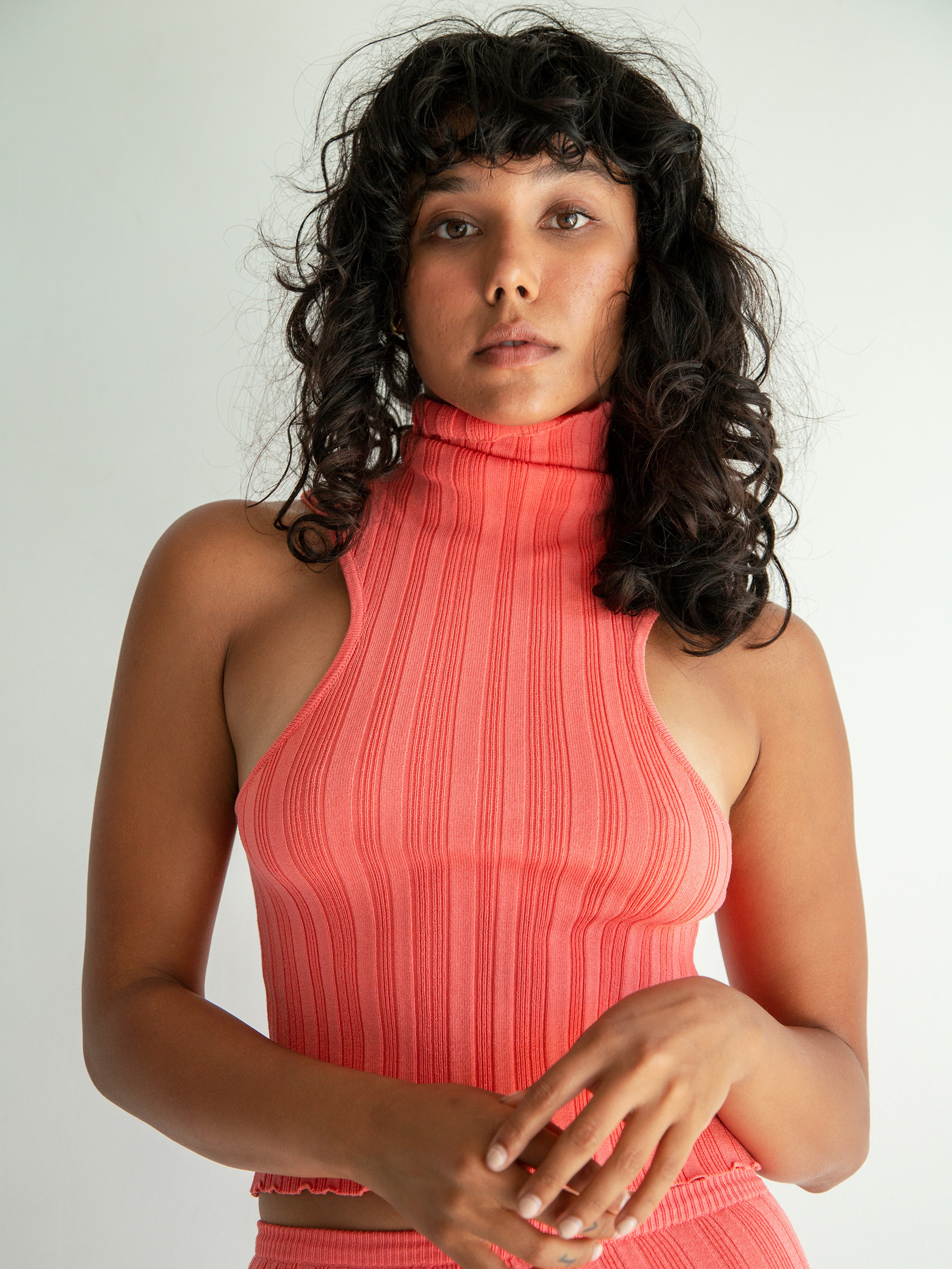 The Line By K Etta Sleeveless Ribbed Turtleneck In Electric Coral